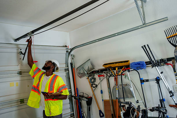 Professional Garage Door Panel Replacement technician working in Boston, MA